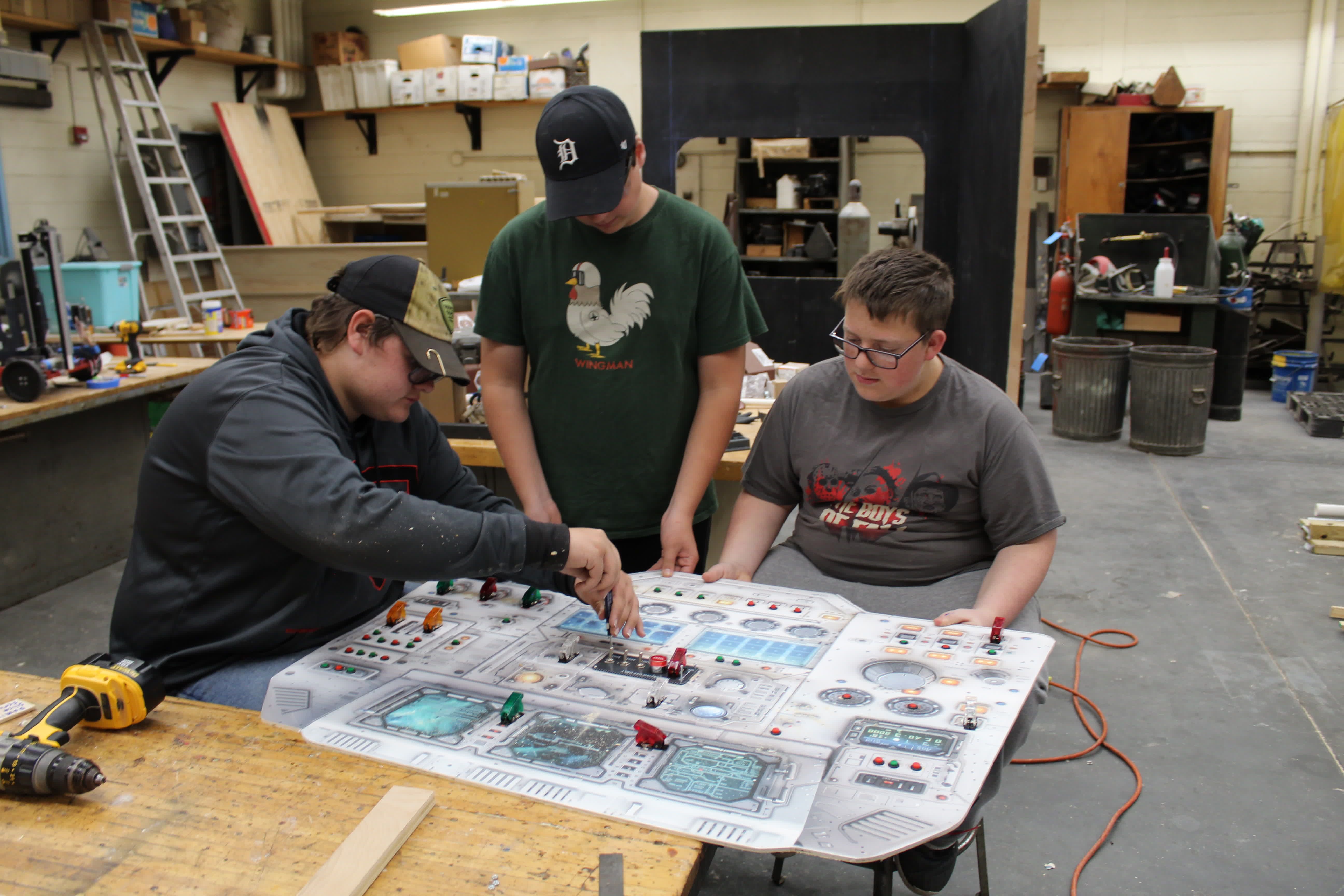 people working on the marketing display